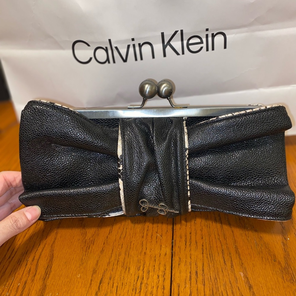 Jessica Simpson clutch with snake skin trim.